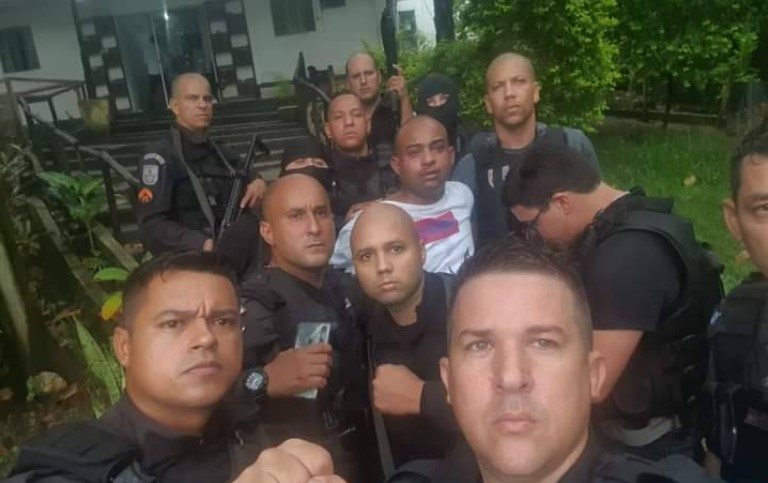 Policiais e o suspeito de matar PM durante assalto