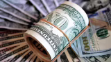 Saída de estrangeiros em maio reduz fôlego da Bolsa e dólar volta a superar R$ 5