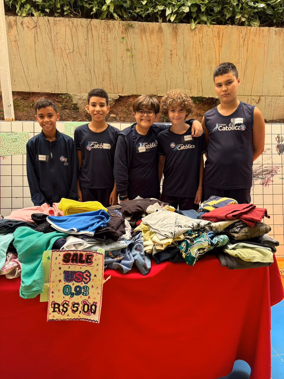 Fwd: Colégio Católica Padre de Man promove Garage Sale com venda de produtos usados