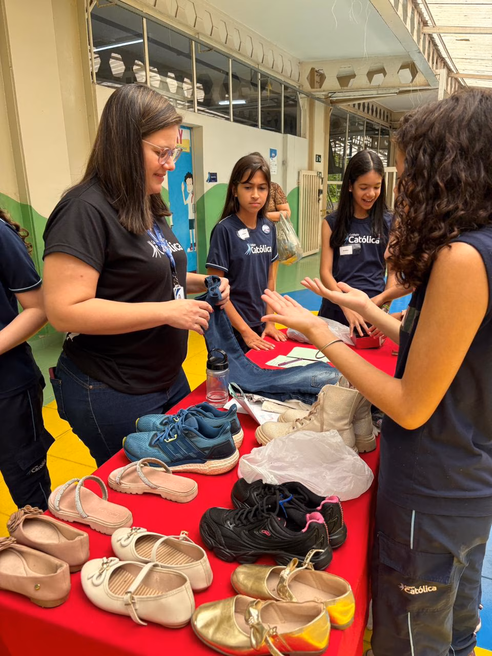 Fwd: Colégio Católica Padre de Man promove Garage Sale com venda de produtos usados