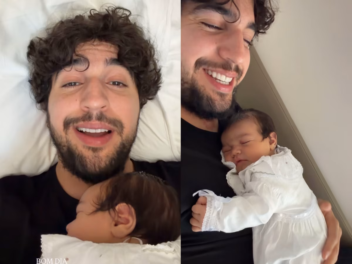 Nattan mostra a filha, Zuza, em seu colo 