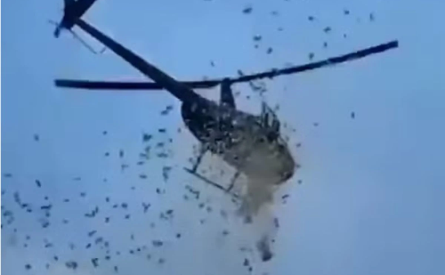 Helicóptero lança dinheiro em homenagem a empresário de Detroit